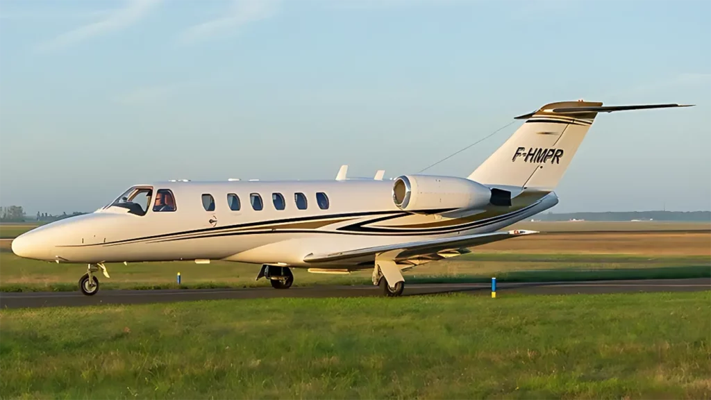 Side view of a Cessna Citation CJ2 parked on a sunny day.