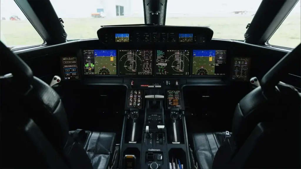 Interior view of Gulfstream G500 cockpit showcasing advanced flight control systems and digital avionics displays