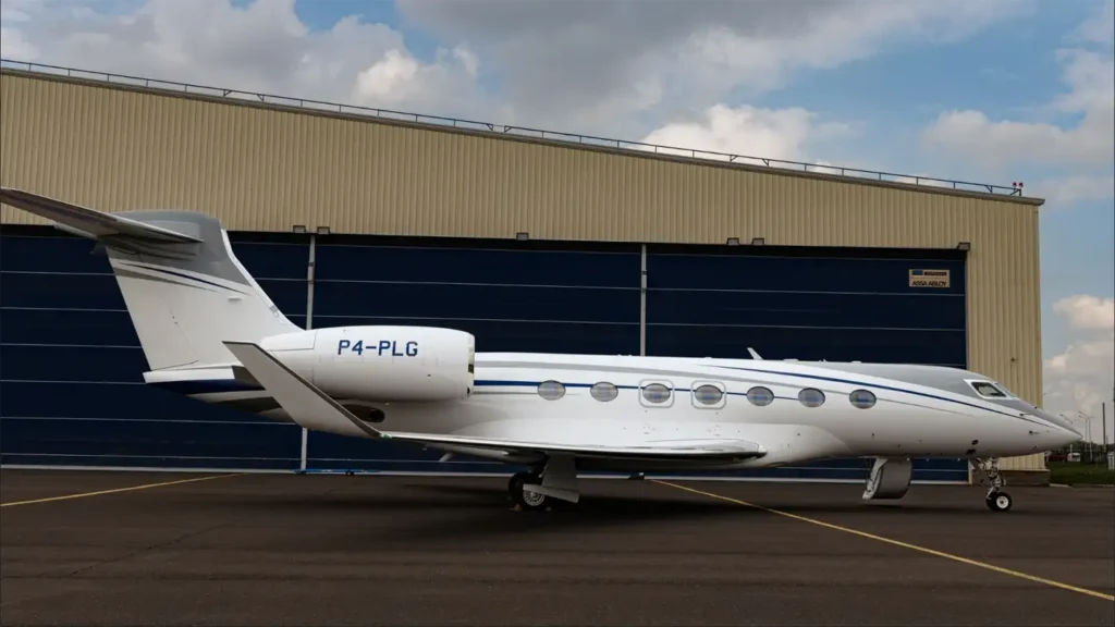 Side view of Gulfstream G500 private jet parked on the tarmac, highlighting its sleek and modern design