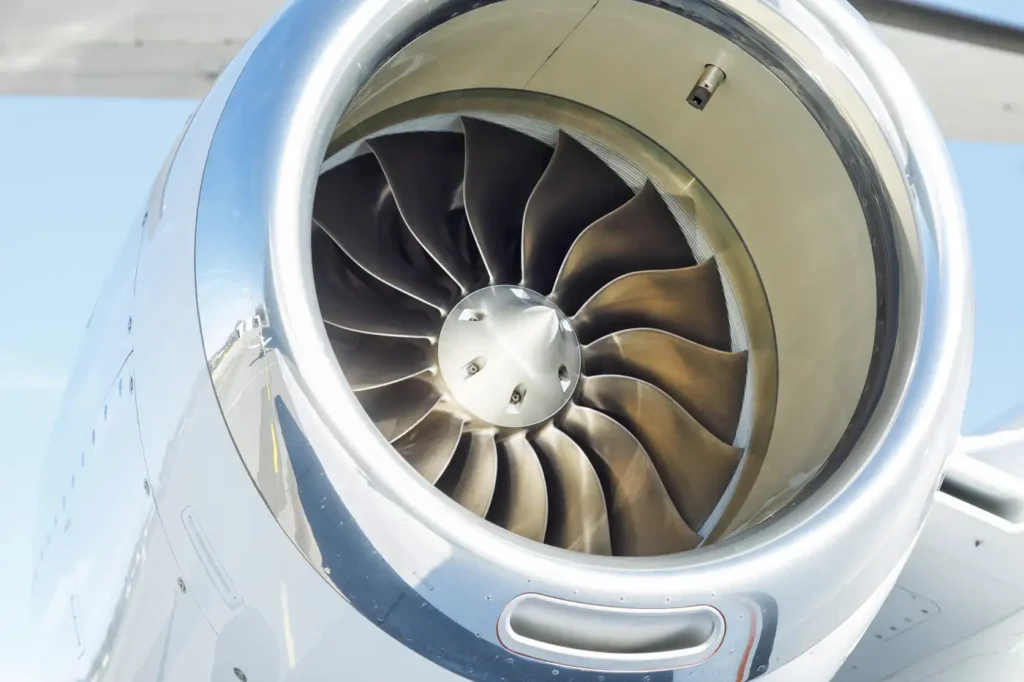 Close-up of Cessna Citation CJ3 engine turbine blades reflecting light