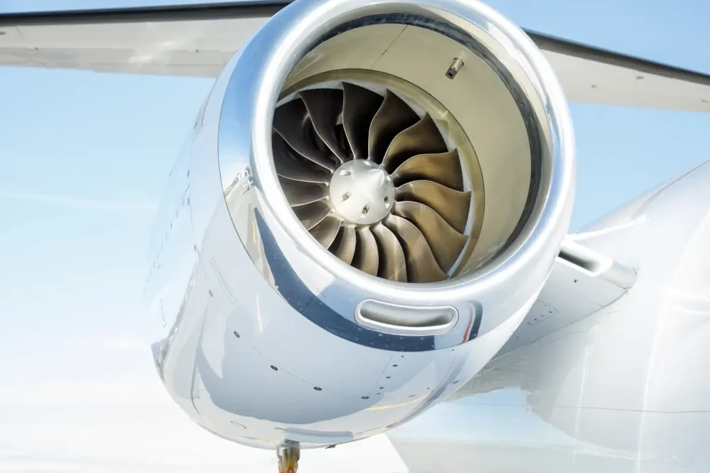 Detailed view of Cessna Citation CJ3 engine and tail wing against blue sky