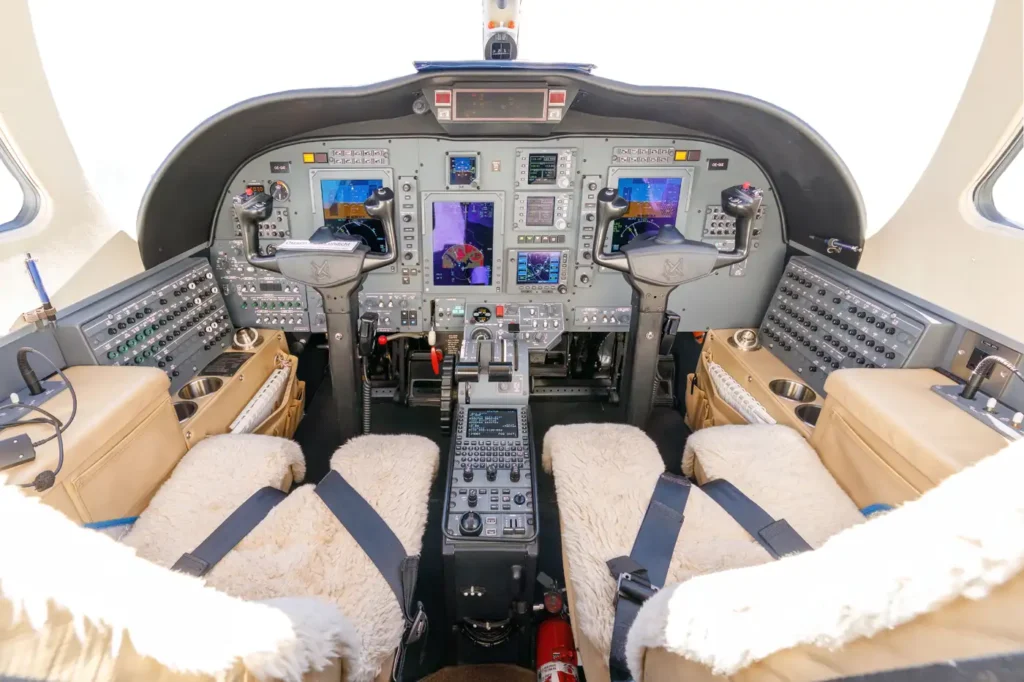 Cockpit of a Cessna Citation CJ3 private jet showing flight instruments and controls